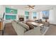 The living room features a fireplace, bright natural light, and mountain views at 7313 W 98Th Pl, Broomfield, CO 80021