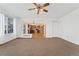 The living room flows into the kitchen to create an open floor plan at 7313 W 98Th Pl, Broomfield, CO 80021