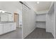 Spacious bathroom with walk in closet and double sink vanity at 7313 W 98Th Pl, Broomfield, CO 80021