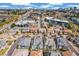 Aerial view of the neighborhood, showcasing manicured lawns and the local business district at 5943 S Olive Cir, Centennial, CO 80111