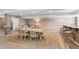 Finished basement with bar, dining area and lounging space at 5943 S Olive Cir, Centennial, CO 80111