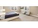 Bedroom with bright windows and comfortable sitting area at 5943 S Olive Cir, Centennial, CO 80111
