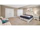 Bedroom with a sitting area and a night stand at 5943 S Olive Cir, Centennial, CO 80111