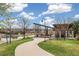 Picturesque community park with a walking path, gazebo, and serene pond, perfect for relaxation at 5943 S Olive Cir, Centennial, CO 80111