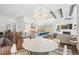 Open floor plan connecting the kitchen, living room, and dining area for easy entertaining at 5943 S Olive Cir, Centennial, CO 80111