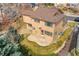 Aerial view of a two-story house with patio and well-maintained backyard at 18736 E Powers Pl, Aurora, CO 80015