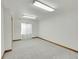 Spacious basement featuring neutral carpeting and trim, ready for your personal touches at 18736 E Powers Pl, Aurora, CO 80015