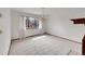 Bright dining room features large windows, chandelier, and neutral color palette at 18736 E Powers Pl, Aurora, CO 80015