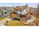 Charming two-story home with appealing curb appeal and a well-manicured front yard at 18736 E Powers Pl, Aurora, CO 80015