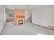 Cozy living room featuring a fireplace, neutral carpeting and lots of light at 18736 E Powers Pl, Aurora, CO 80015