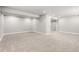 Spacious finished basement with neutral paint, carpet, and recessed lighting at 24726 E Louisiana Cir, Aurora, CO 80018