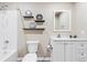 Finished basement bathroom with shower/tub and modern vanity at 24726 E Louisiana Cir, Aurora, CO 80018