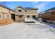 Backyard with a deck and snowy landscape at 6356 Blue Water Cir, Castle Rock, CO 80108