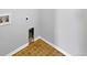 Laundry room with tiled floor and built-in shelving at 6356 Blue Water Cir, Castle Rock, CO 80108