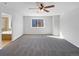 Main bedroom with en-suite bathroom and large window at 6356 Blue Water Cir, Castle Rock, CO 80108