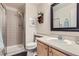 Bathroom featuring a glass enclosed shower, vanity, and neutral finishes at 10273 Bentwood Ln, Highlands Ranch, CO 80126
