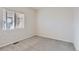 Cozy bedroom with neutral carpeting and a window providing natural light at 10273 Bentwood Ln, Highlands Ranch, CO 80126