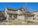 Charming two-story home with great curb appeal, attached garage and covered front porch at 10273 Bentwood Ln, Highlands Ranch, CO 80126