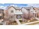 Beautiful two-story home with a charming front porch and well-manicured landscaping at 6723 Raritan Dr, Denver, CO 80221