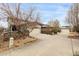 View of several detached garages in the community, with ample parking space at 6723 Raritan Dr, Denver, CO 80221