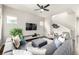 Inviting living room features modern decor, hardwood floors, and an open layout with comfortable seating arrangements at 6723 Raritan Dr, Denver, CO 80221