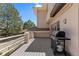 Outdoor deck featuring a grill and plenty of room for entertaining guests at 69 N Ranch Rd, Littleton, CO 80127