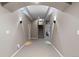 Finished basement hallway with recessed lighting, neutral walls, and a carpeted floor at 69 N Ranch Rd, Littleton, CO 80127