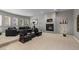 Spacious living room featuring a fireplace, comfortable seating, and natural light at 69 N Ranch Rd, Littleton, CO 80127