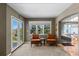 Bright sitting room featuring a seating area and a scenic view of the natural landscape at 69 N Ranch Rd, Littleton, CO 80127