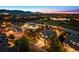 Aerial shot of a neighborhood with mountain views at twilight at 16267 W 59Th Pl, Golden, CO 80403