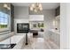 Modern bathroom with soaking tub, fireplace, dual vanity and natural light at 16267 W 59Th Pl, Golden, CO 80403
