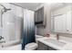 Charming bathroom featuring modern fixtures, stylish tiles, and coordinated vanity at 16267 W 59Th Pl, Golden, CO 80403