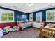 Charming bedroom featuring bold colors, playful decor and two beds, perfect for children at 16267 W 59Th Pl, Golden, CO 80403