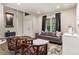 Cozy living room featuring modern furnishings and inviting decor at 16267 W 59Th Pl, Golden, CO 80403