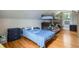 Cozy bedroom with hardwood floors and a bunk bed at 3655 Zenobia St, Denver, CO 80212