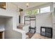 Bright entrance featuring white brick walls, a coat rack, and convenient storage space at 3655 Zenobia St, Denver, CO 80212