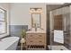 Bathroom featuring a soaking tub, vanity, and glass shower with elegant tile surround at 342 Brook Cir, Boulder, CO 80302