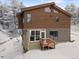 Exterior of a two-story home surrounded by snow-covered trees at 342 Brook Cir, Boulder, CO 80302