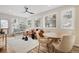 Open living room featuring large windows and natural light, with stylish furniture and decor at 342 Brook Cir, Boulder, CO 80302