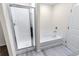 Clean bathroom featuring a shower, and a soaking tub at 7302 Arkansas Street, Frederick, CO 80530