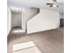 Spacious living room with plush carpeting, recessed lighting, and neutral color palette at 7302 Arkansas Street, Frederick, CO 80530