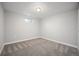 Neutral color basement space with small window providing natural light at 8626 W Utah Ave, Lakewood, CO 80232