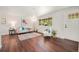 Bright and modern living room with hardwood floors, a comfortable sofa, and natural light at 8626 W Utah Ave, Lakewood, CO 80232