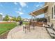 Relaxing backyard patio with seating, grill, and covered deck, ideal for entertaining guests at 10870 Crestone Needles Dr, Parker, CO 80138
