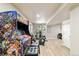 Recreational space with an arcade game, and exercise equipment in a finished basement at 10870 Crestone Needles Dr, Parker, CO 80138