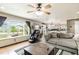 Spacious living room offering natural light and an open flow to the kitchen at 10870 Crestone Needles Dr, Parker, CO 80138