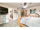 A lovely main bedroom features an en suite bathroom, ceiling fan, and home sauna at 10870 Crestone Needles Dr, Parker, CO 80138