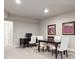 Versatile dining space with a desk and a table perfect for work and meals at 6970 E Lake Dr, Centennial, CO 80111