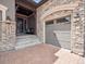 Charming home featuring a stone facade, front porch, and inviting entrance at 6970 E Lake Dr, Centennial, CO 80111
