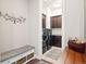 Convenient laundry room with modern machines, dark wood cabinets, and stylish decor at 6970 E Lake Dr, Centennial, CO 80111